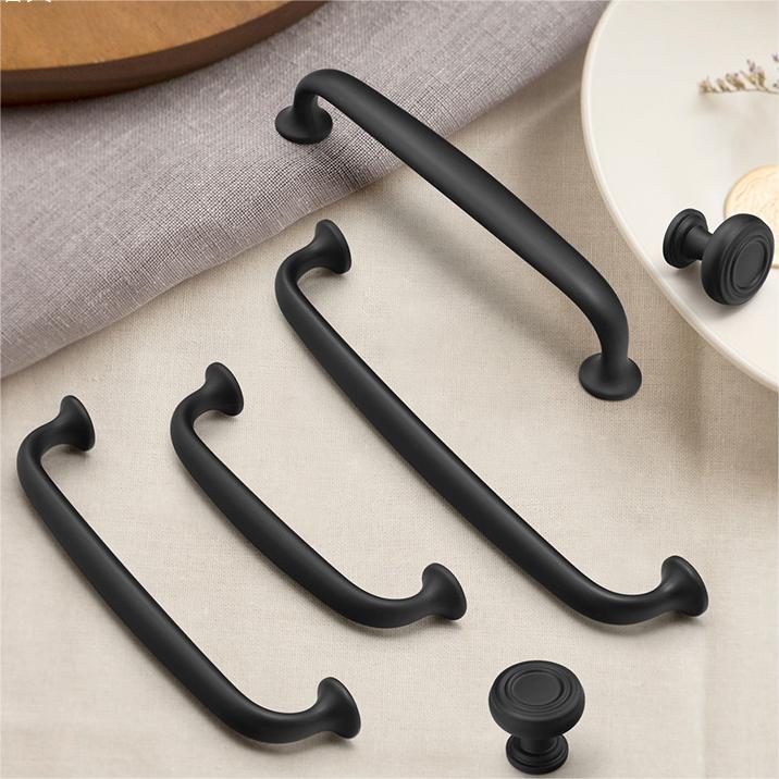 Minimalist Black Bow Kitchen Cabinet Handles Pulls by LookiDecor