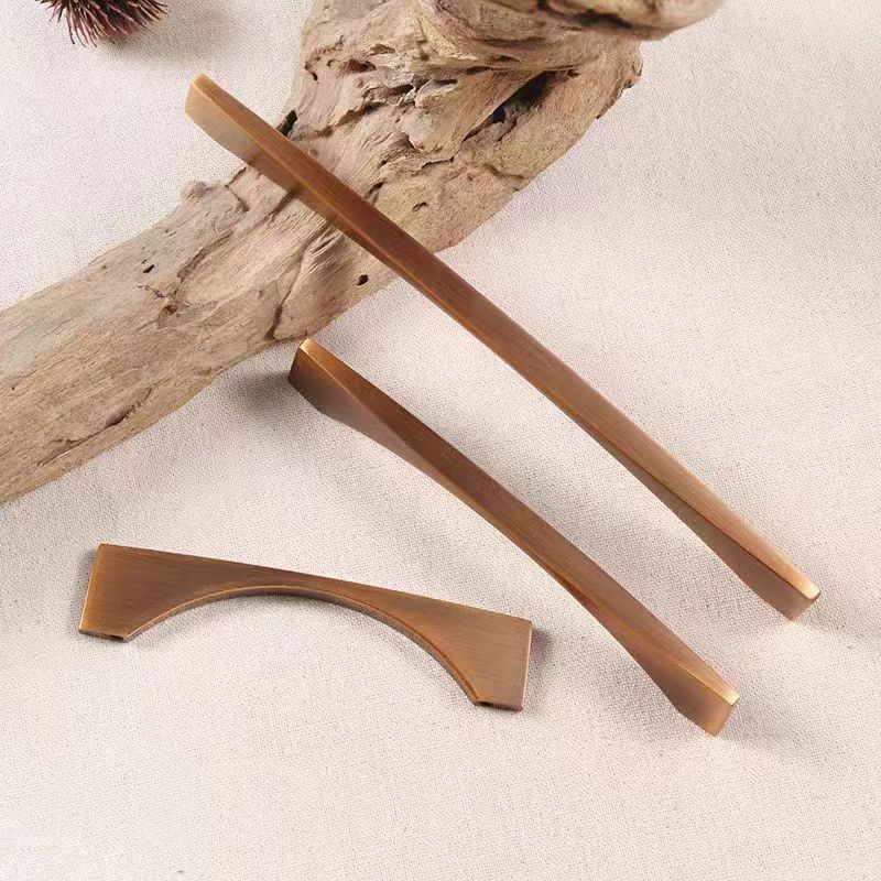Aluminum Alloy Brushed Brass Bow Pull Cabinet Handles for Kitchens by LookiDecor